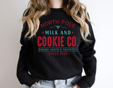 North Pole Milk And Cookie Co. Baking Santa’s Favorites Since 1943 Shirt, North Pole Christmas Sweatshirt, Funny Christmas North Pole Tees - Nesta Tees