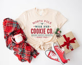 North Pole Milk And Cookie Co. Baking Santa’s Favorites Since 1943 Shirt, North Pole Christmas Sweatshirt, Funny Christmas North Pole Tees - Nesta Tees